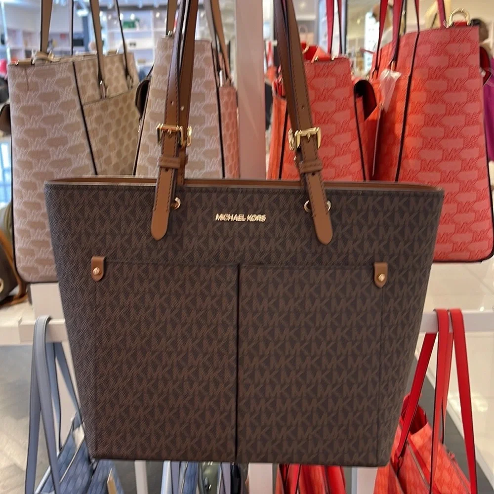 MICHAEL KORS JET SET TRAVEL MEDIUM DOUBLE POCKET TOTE 
BROWN SIGNATURE
NWT - Picture 10 of 16